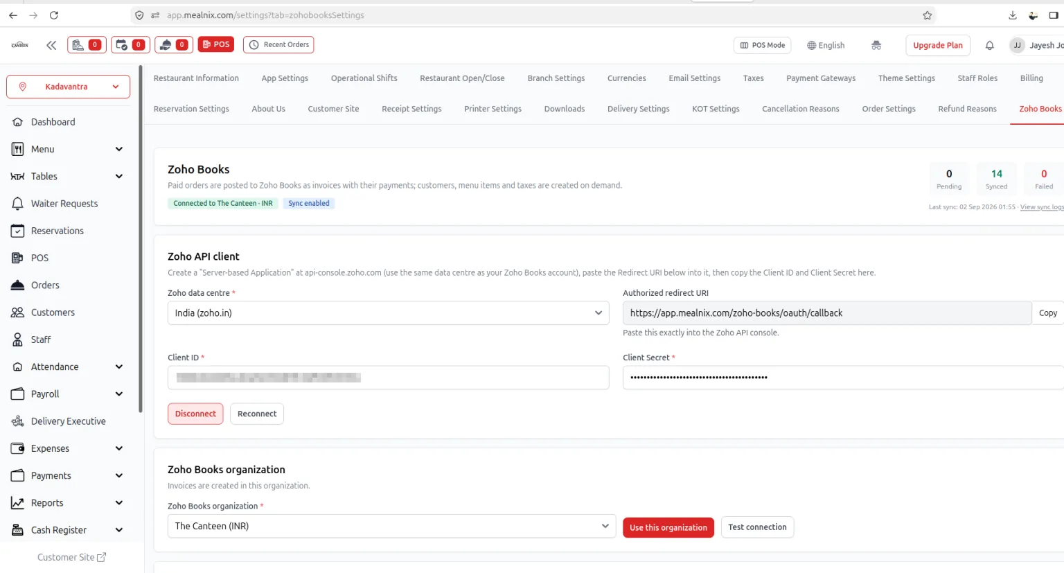 The Zoho Books settings tab in MealNix showing a connected organisation, a sync-enabled badge, pending, synced and failed counters, and the Zoho API client credential fields including data centre and authorised redirect URI.